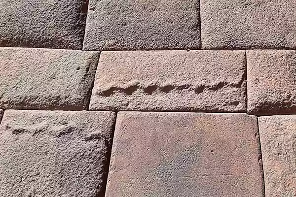 Snakes Carved in Inca Wall